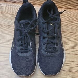 Puma Black Athletic Shoes with Gold Accents